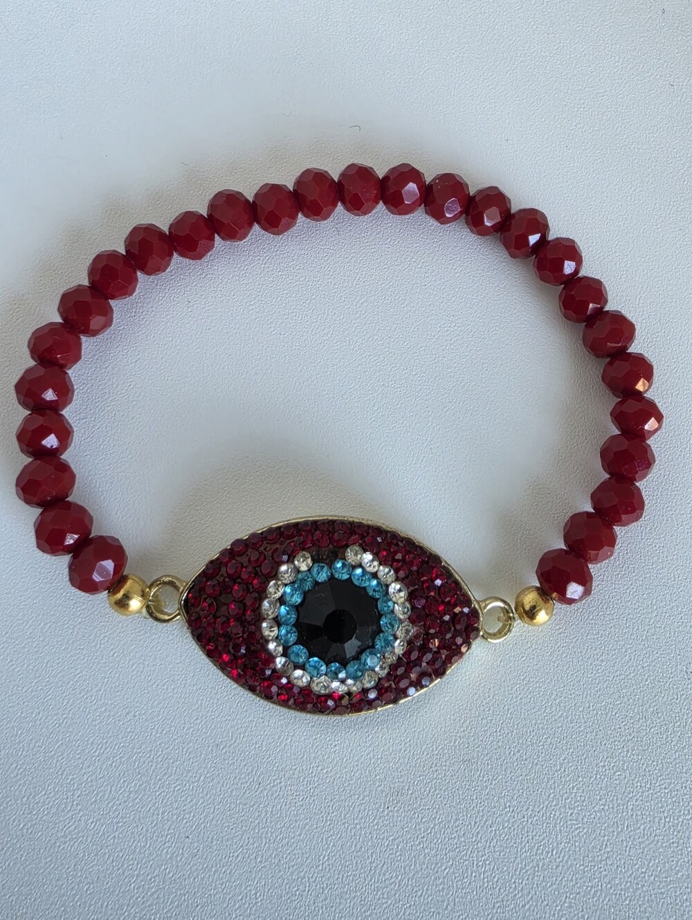 Handmade stretch bracelet  faceted deep red crystal beads and a sparkling